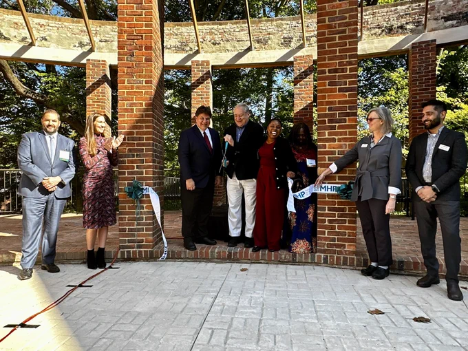 Officials cutting the ribbon