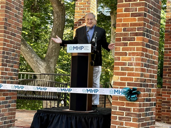 County Executive Marc Elrich at the podium speaking to the audience.