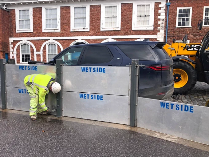 Temporary barrier deployment at Exeter Quay.