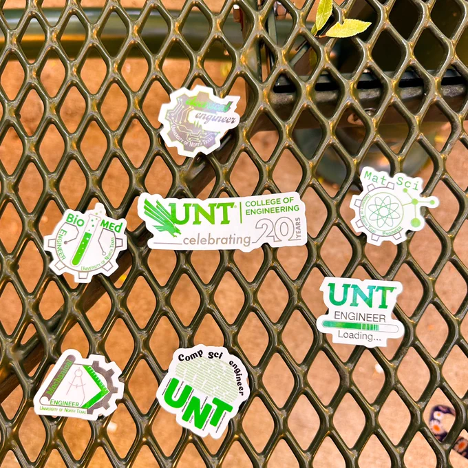 A photo of different stickers that represent the 5 different departments in Engineering with their corresponding icons.