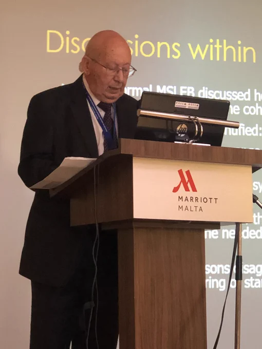 Image of prof Frank Ventura standing at podium