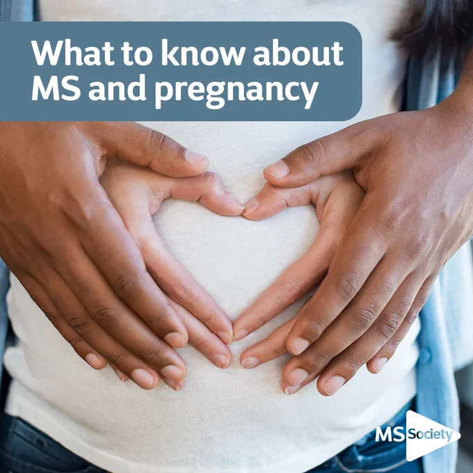 This image shows two hands placed on a pregnant stomach making a heart with their fingers. In the top left hand corner is the text 'what to know about MS and pregnancy'