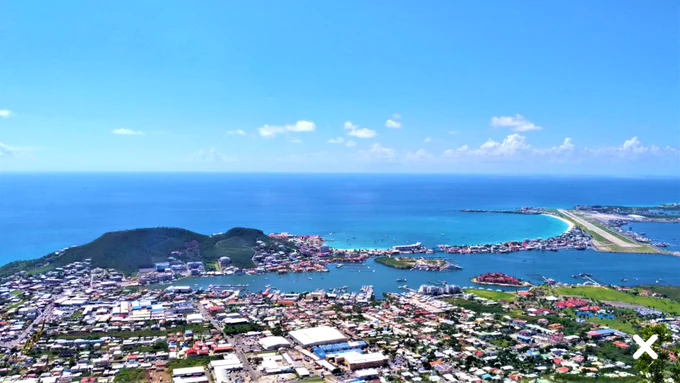Arial view of the island of St. Maarten in the Caribbean. A view of the airport runway at Princess Juliana Airport can be seen on the right hand side. 