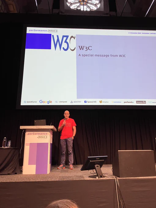 Yoav on stage with a brief chat about the W3C
