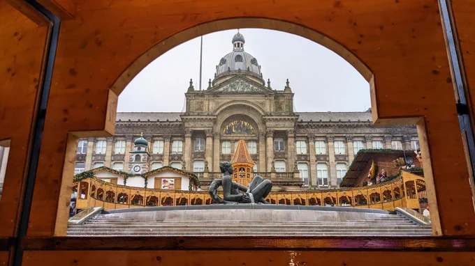 Birmingham Town Hall with floozie statue and Christmas market