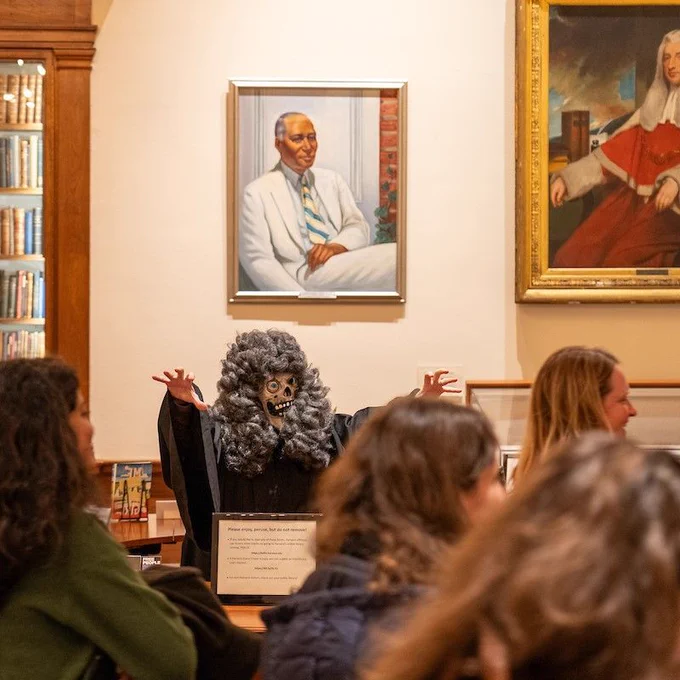 A ghoul haunts tour guests in the Library's Caspersen Room. 