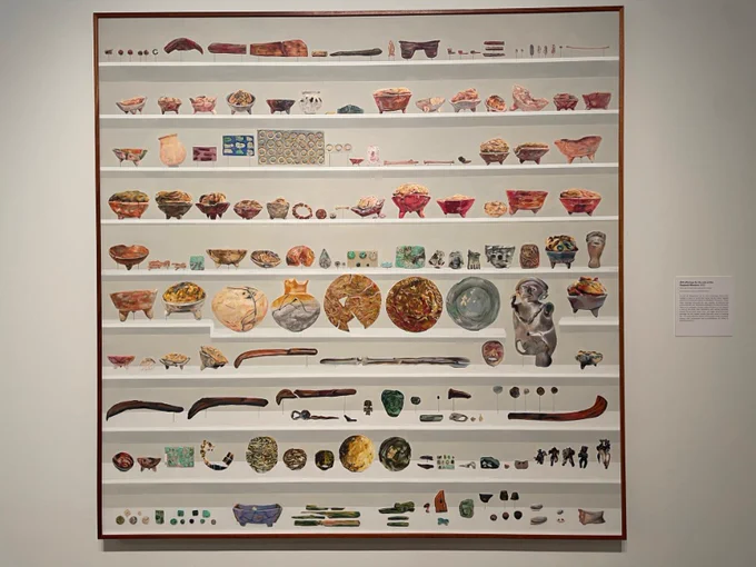 Drawings of cenote finds- beautiful, colorful, all lined up on shelves 