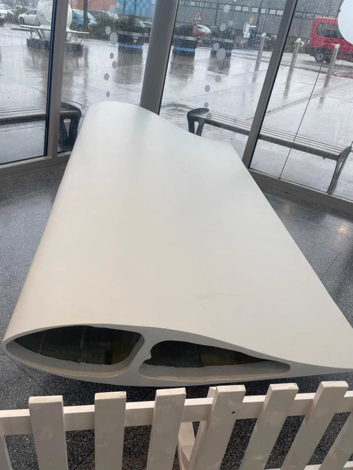 A closer up image of the wind turbine blade section displayed in The Deep's Reception area.