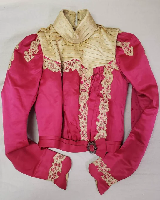 Red and gold bodice from the History collection: Looking at old black and white photos can sometimes trick us into thinking that people lived colorless lives in the past, but as this c.1900 bodice shows, people in the past were surrounded by vibrant colors. Clothing became incredibly colorful with the development of aniline dyes in the late 19th and early 20th centuries. Aniline, a by-product of coal tar, made it possible to synthesize vibrant dye colors inexpensively. As a result, fashions, especially for women, grew brighter and more colorful.