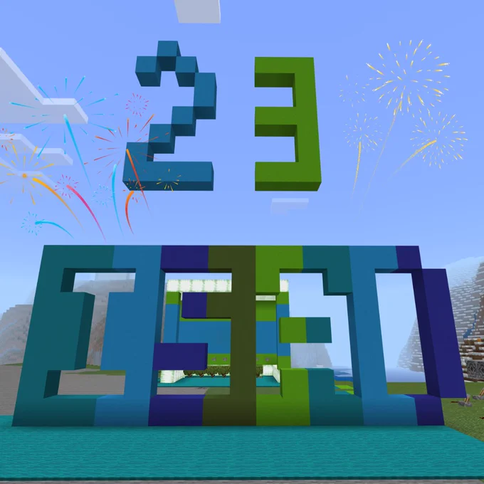 A picture from Minecraft game showing stripes of concrete in shades of blue and green, with letter shapes cut out to spell ISAD. Numbers 23 float above, to represent ISAD 23.  Happy ISAD 2023!
