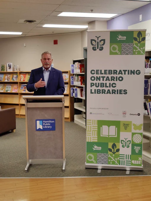 Photograph of Neil Lumsden speaking at the Ontario Public Library Week celebration at the Hamilton Public Library Stoney Creek Branch.