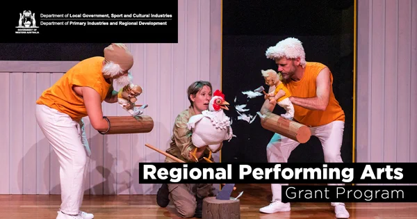 Performers on staging using puppets