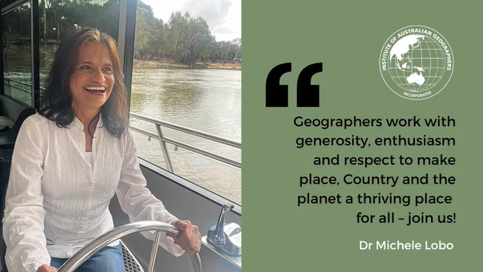 Michele steers a boat with IAG logo and quote to the right saying "Geographers work with generosity, enthusiasm and respect to make place, Country and the planet a thriving place for all - join us!