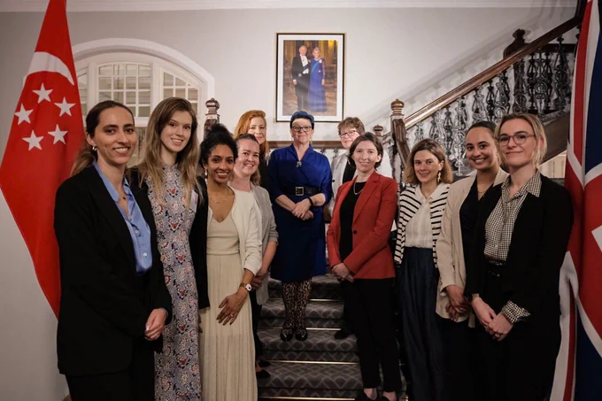 Minister Neville-Rolfe with with female cyber professionals at Singapore International Cyber Week.