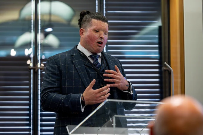 Photo of Andreas Christophero speaking at the event.