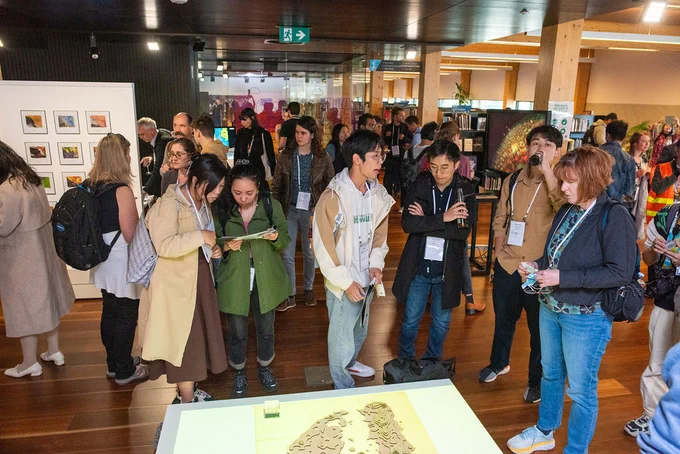 Over 150 people turned out for VISAP at library at the Dock, standing around artworks 