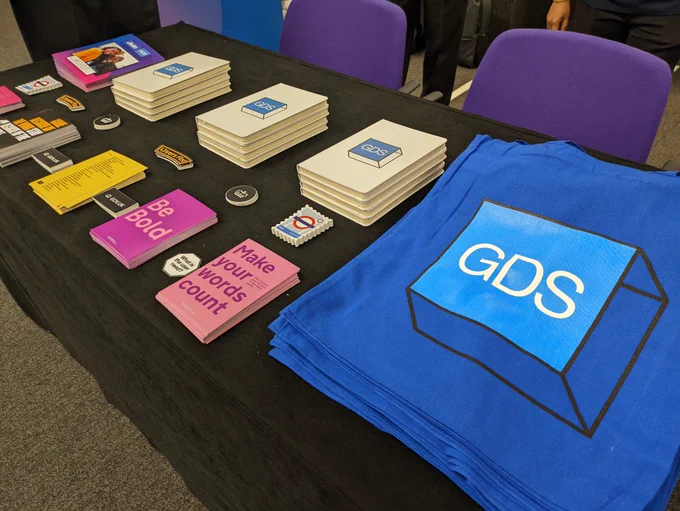 Government Digital Service stand at the Security Cleared Expo with merchandise. 