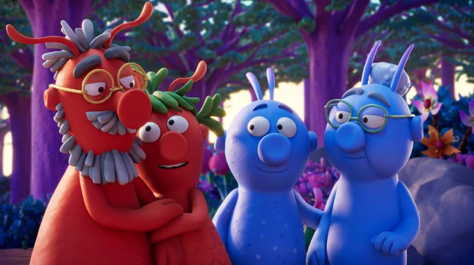 A couple of red characters and blue characters gather together in a woodland. 