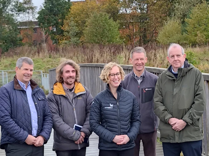 L-R Charlie Cumming, Edinburgh & Lothians Greenspace Trust (ELGT) Chief Executive, Ross Woodside ELGT Head of Operations, Biodiversity Minister Lorna Slater, Scott Thomson, Parks Development Officer, Edinburgh City Council, and NatureScot Chair, Colin Galbraith at Hunters Hall Park, Edinburgh, part of the NRF funded Pentlands to Portobello greening project.