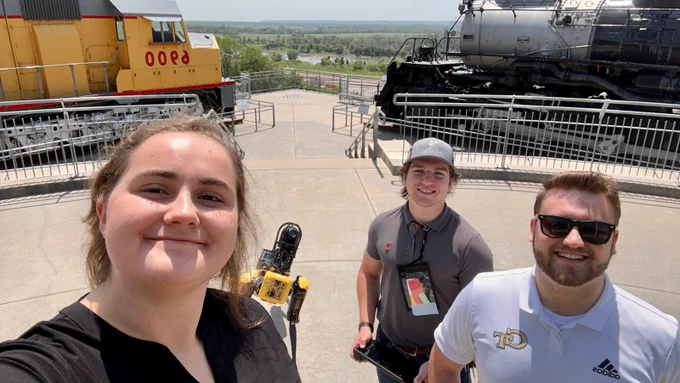 Students pose with Astro at Kenefick Park, Omaha, Nebraska