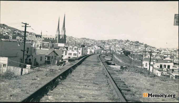 30th near Dolores circa 1942
Southern Pacific Old Main Line, View north from the right-of-way across 30th Street Bridge. St. Paul 's Church at left