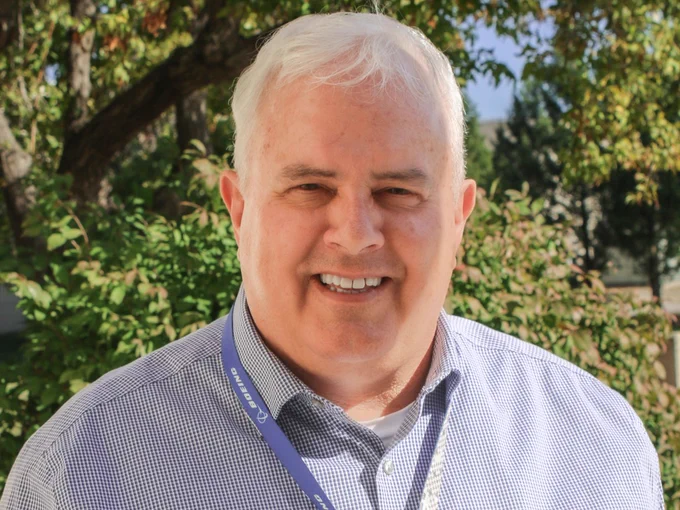 A headshot of Neal Bloomquist.