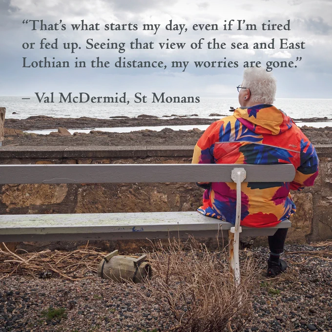 Val McDermid sitting by the sea