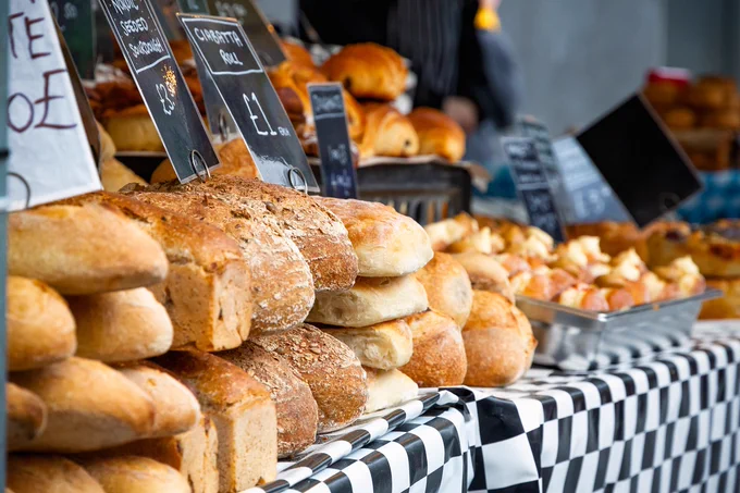 Illustrative picture of a market stall selling bread products
