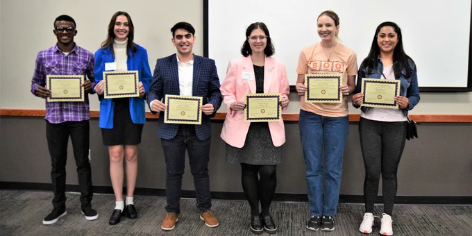 Six of the winners of Research and the State, a poster forum for graduate students at Kansas State University, are pictured. From left: Fidelis Onwuagba, Holly Ellis, Amirsalar Bagheri, Savannah Stewart, Ramona Weber and Andrea Salazar. In total, 10 graduate students will represent the university at the 2024 Capitol Graduate Research Summit on March 21, 2024.