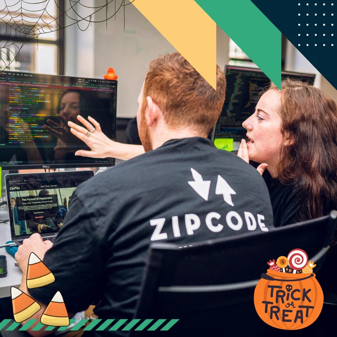 A male and female student learn coding together at Zip Code Wilmington.