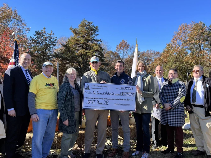 Rep. Trahan stands with state and local leaders with a check for the Towns of Acton and Concord.