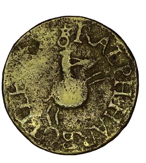 Circular brass token of Ralph Harbottle with a design of a long necked 'onion' wine bottle forming the body if a running hare