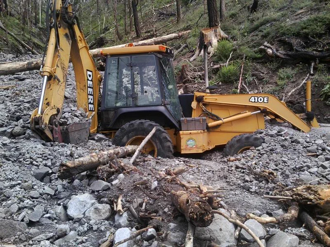Heavy equipment caught in a debris flow after the Schultz Fire in the Coconino National Forest in Arizona
