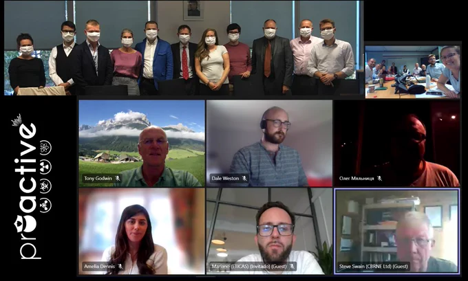 in-person group photo & screenshot of online attendees.
