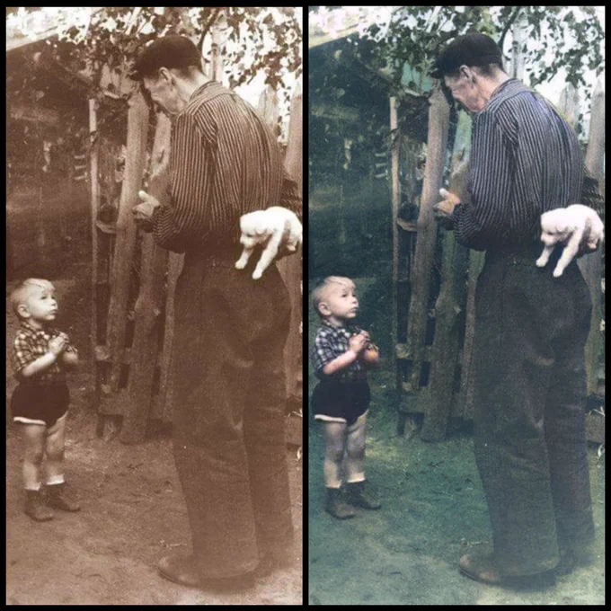 A 1955 photograph that depicts a man holding a puppy behind his back with his right hand, about to present it to a young boy.