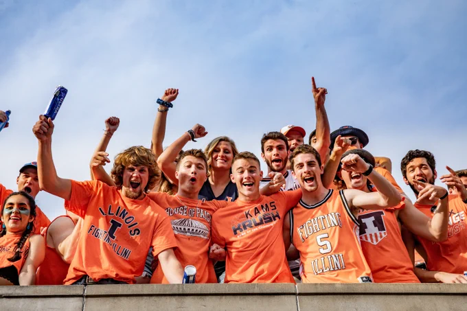 a group of fans cheering