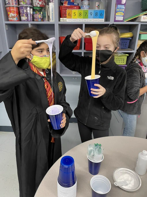Two children making slime