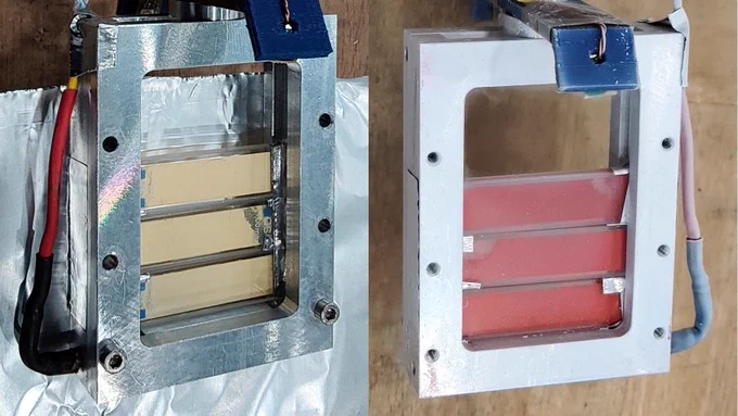 The new sample environment before illumination of the sample and afterwards, showing the colour change.

