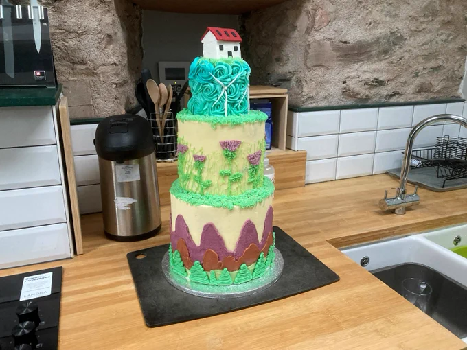 An incredible cake depicting Greenmyres created by Maggie Milne, winner of the senior bake off at Hairst.