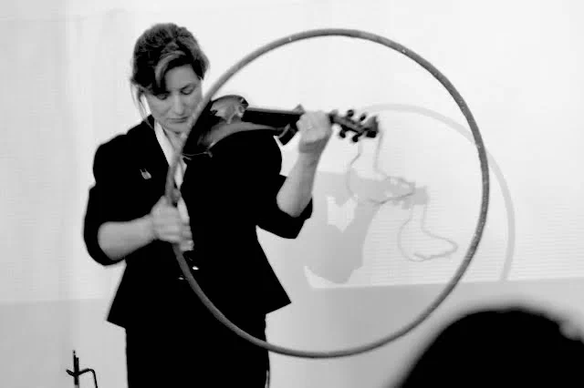 Tansy specializes in solo and collaborative sound performances incorporating electric violin, looping devices, and objects related to the given performance space; and she has a particular interest in materiality in sound. Tansy has performed in venues such as the Victoria & Albert Museum, the Camden Arts Centre, Brighton Fringe Festival and Wimbledon Space among others; and her site-specific performance spaces include a sea fort off the north Kent coast, staircases, lifts, a market arcade and on top of a windmill. She has exhibited widely both at home and abroad, and is a Senior Lecturer in Fine Art at Middlesex University. 
