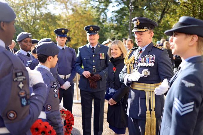 Image shows personnel attending the memorial.
