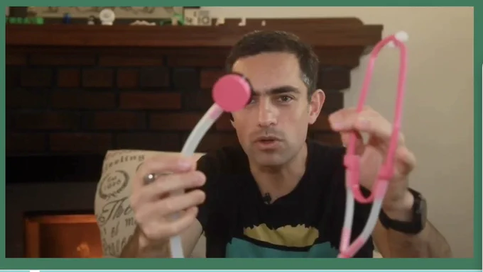Tarke Loubani holding a simple stethoscope