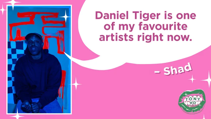 A quote card featuring a headshot of the guest, Shad. The photo is blue in tone and Shad is looking at the camera wearing a hoodie with a bright red abstract line in the background. There is a speech bubble coming from his mouth that reads “Daniel Tiger is one of my favourite artists right now.” The Tony Ho podcast cover of green lips is in the right hand bottom corner.