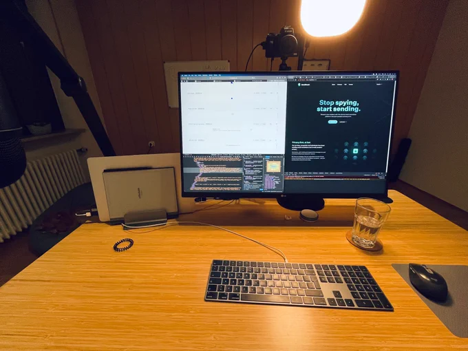 Desktop with a large display with code on it 