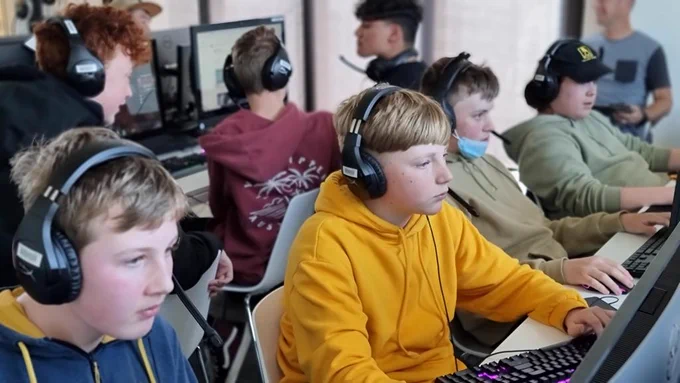 Engaged students enjoying Esports at library PC lab. Valorant and League of Legends going strong.