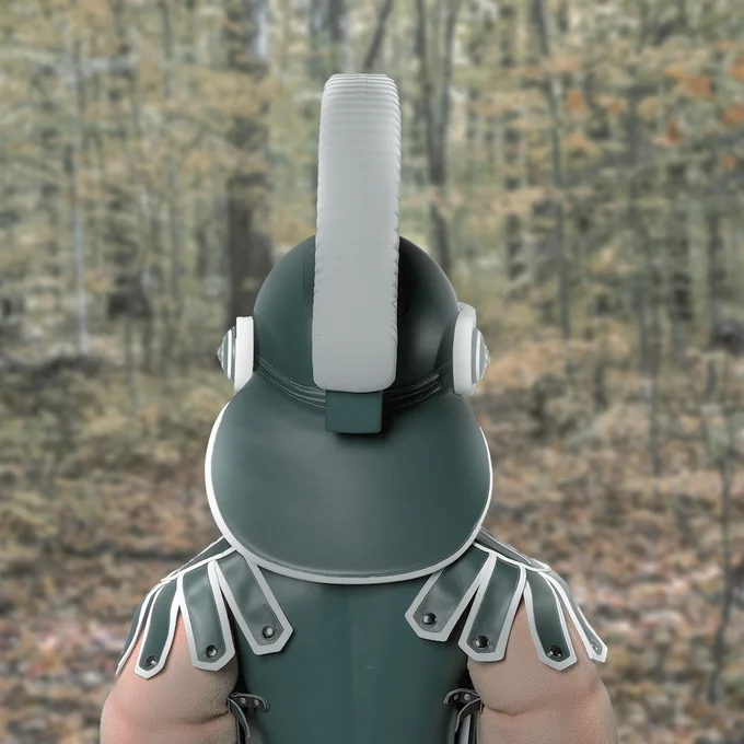 View of Sparty's back as he stands in the middle of the woods. The photo is filtered to look like Taylor Swift's Folklore album art. 