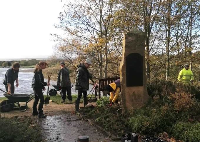 Moray College UHI horticulture students at work in the Famous Fochaberians Memorial Gardens, with the River Spey in the background. 
