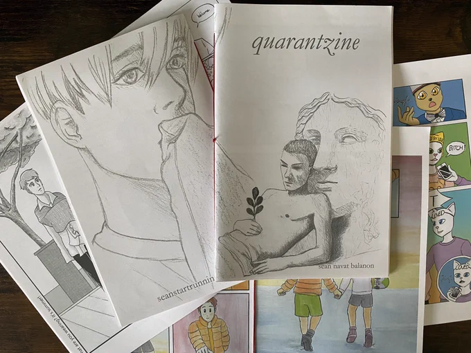 printed copies of my zine, titled quarantine