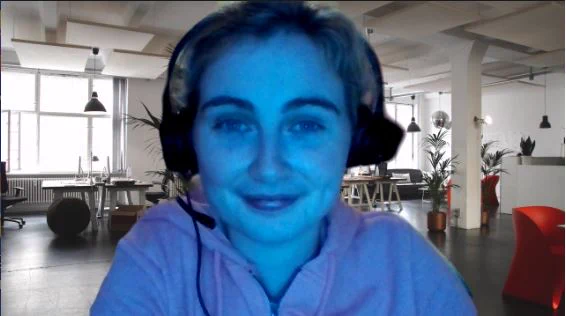 Screenshot of Ruth on Zoom, lit up in blue.