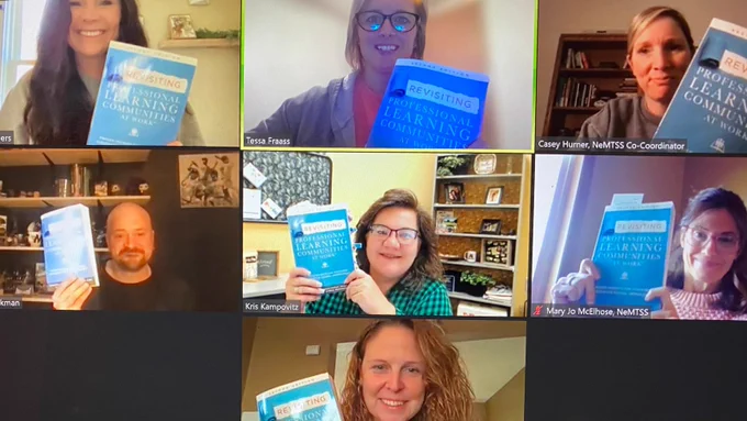 Zoom screens with people holding up copies of the same book.